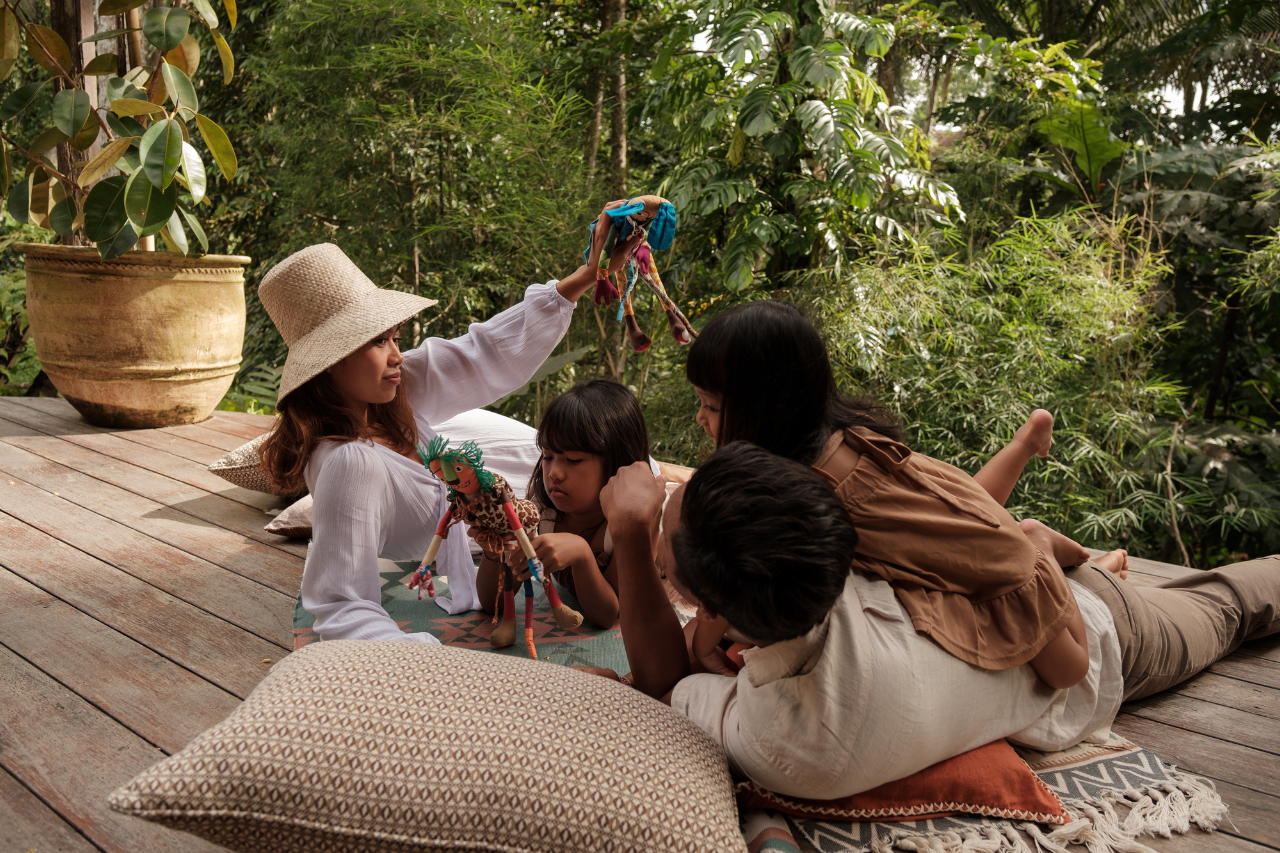 Happy family enjoying a luxury private villa with kids in Bali